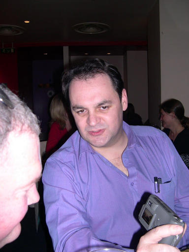 Adrian__showing_Paul_his_handywork.jpg